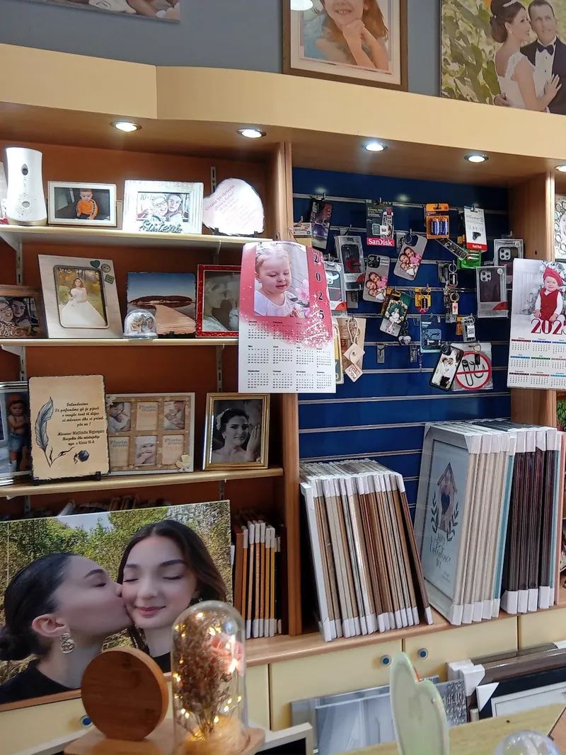 Shelves of albums, frames, calendars and canvas prints inside the studio